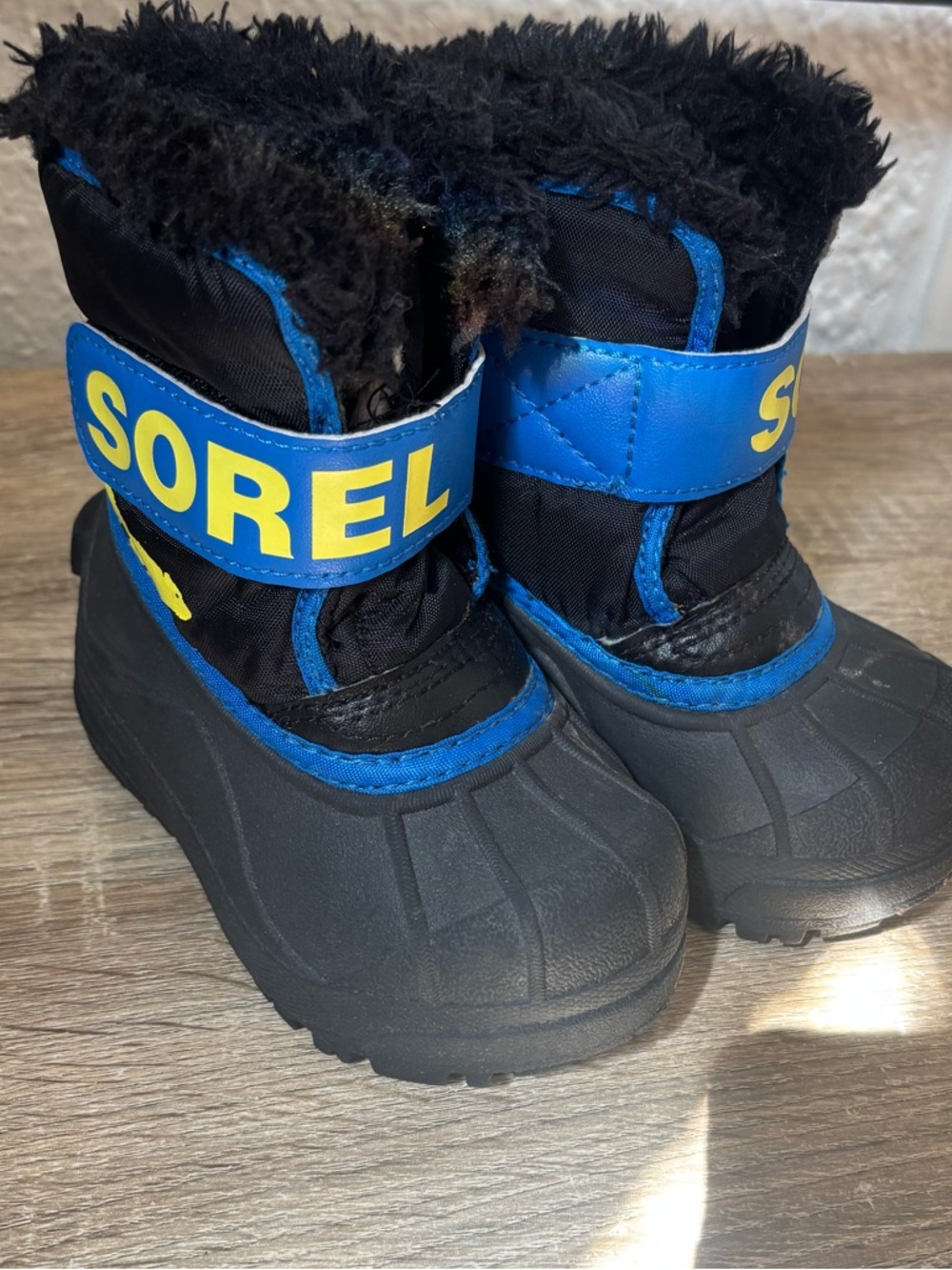 Sorel Kids Black and Blue Winter Boots with Yellow Logo